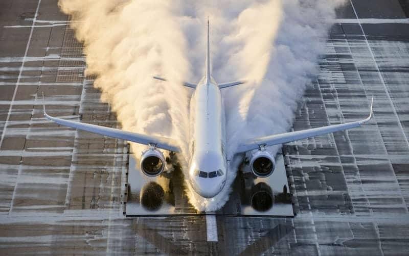 A white Airbus A350 on a runway